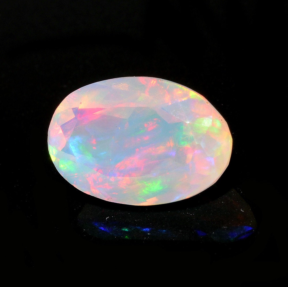 FIRE OPALS, Cabochons, high quality plain and Faceted.