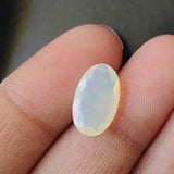 7.7x13mm Huge Ethiopian Opal, Oval Faceted Opal, Fancy Cut Faceted 1.60 Cts