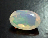 6.7x10.6mm Huge Ethiopian Opal, Oval Faceted Opal, Fancy Cut, Faceted 1.30 Cts