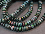 4.5-5mm Black Ethiopian Welo Opal Faceted Rondelle Beads, 4 Inch Natural Fire